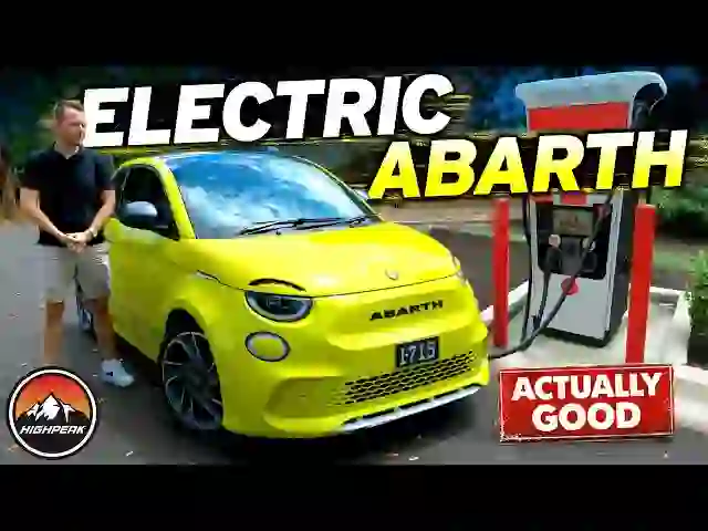 Lime‑Green Abarth 500E: Electric Sports Car Racing Through City Streets